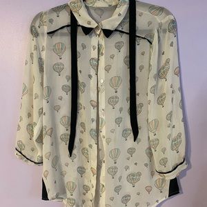Hot air balloon blouse size 6-8 with black accents